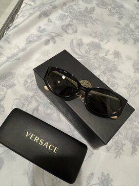 Versace Black Sunglasses with Dark Lenses - Women's Fashion Accessory